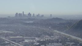 HD stock footage aerial video of a view of the Downtown Los Angeles skyline, Silver Lake Reservoir, and I-5 freeway, California Aerial Stock Footage | CAP_012_006