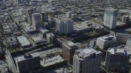 HD stock footage aerial video flyby tall office buildings beside the 134 freeway in Glendale, California Aerial Stock Footage | CAP_012_009