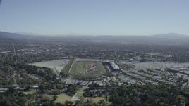 HD stock footage aerial video approach the Santa Anita Park horse racing track in Arcadia, California Aerial Stock Footage | CAP_012_015