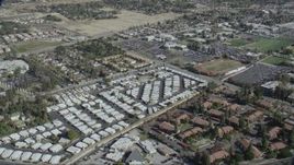 HD stock footage aerial video flyby a mobile home park and apartment buildings in Asuza, California Aerial Stock Footage | CAP_012_020