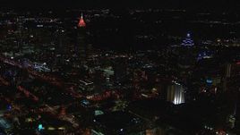 HD stock footage aerial video of flying by tall skyscrapers at night, Downtown and Midtown Atlanta, Georgia Aerial Stock Footage | CAP_013_012