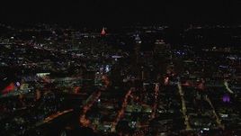 HD stock footage aerial video reverse view of city buildings and skyscrapers at night, Downtown Atlanta, Georgia Aerial Stock Footage | CAP_013_030