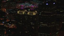 HD stock footage aerial video of circling 191 Peachtree Tower at night, Downtown Atlanta, Georgia Aerial Stock Footage | CAP_013_033