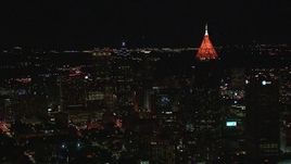 HD stock footage aerial video of downtown skyscrapers and Bank of America Plaza at night, Midtown Atlanta, Georgia Aerial Stock Footage | CAP_013_037