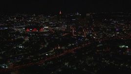 HD stock footage aerial video of a wide view of the stadium and downtown skyline at nighttime, Downtown Atlanta, Georgia Aerial Stock Footage | CAP_013_047
