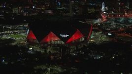 HD stock footage aerial video of the stadium at nighttime, Atlanta, Georgia Aerial Stock Footage | CAP_013_049