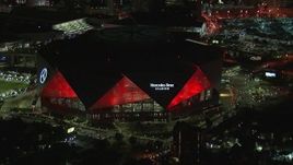HD stock footage aerial video of orbiting the stadium at nighttime, Atlanta, Georgia Aerial Stock Footage | CAP_013_050