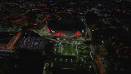 HD stock footage aerial video of the stadium at nighttime, Atlanta, Georgia Aerial Stock Footage | CAP_013_057