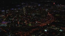 HD stock footage aerial video of approaching downtown's skyscrapers and city buildings at night, Downtown Atlanta, Georgia Aerial Stock Footage | CAP_013_068