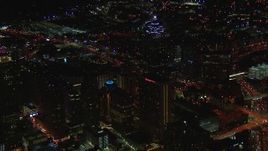 HD stock footage aerial video of an approach to SunTrust Plaza and city buildings at night, Downtown Atlanta, Georgia Aerial Stock Footage | CAP_013_070