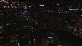 HD stock footage aerial video fly away from SunTrust Plaza and Westin Hotel at night, Downtown Atlanta, Georgia Aerial Stock Footage | CAP_013_073