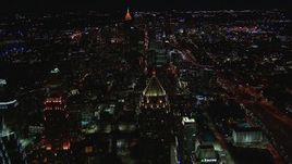 HD stock footage aerial video wide view of Midtown, reveal One Atlantic Center at night, Midtown Atlanta, Georgia Aerial Stock Footage | CAP_013_076