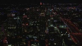 HD stock footage aerial video fly away from One Atlantic Center and city buildings at night, Midtown Atlanta, Georgia Aerial Stock Footage | CAP_013_077