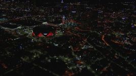 HD stock footage aerial video of slowly flying toward and tilting to the stadium at night, Atlanta, Georgia Aerial Stock Footage | CAP_013_086