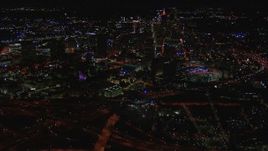 HD stock footage aerial video of passing by the state capitol building and skyscrapers at night, Downtown Atlanta, Georgia Aerial Stock Footage | CAP_013_095