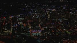 HD stock footage aerial video of a wide view of city buildings and skyscrapers at night, Downtown Atlanta, Georgia Aerial Stock Footage | CAP_013_097