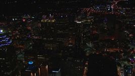 HD stock footage aerial video fly away from tall city skyscrapers at night, Downtown Atlanta, Georgia Aerial Stock Footage | CAP_013_102