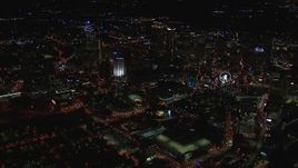 HD stock footage aerial video wide reverse view of tall city skyscrapers at night, Downtown Atlanta, Georgia Aerial Stock Footage | CAP_013_104