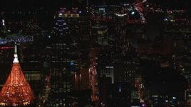 HD stock footage aerial video of skyscrapers towering over downtown buildings at night, Downtown Atlanta, Georgia Aerial Stock Footage | CAP_013_107