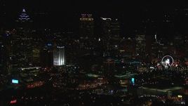 HD stock footage aerial video of slowly flying away from the city's downtown skyline at night, Downtown Atlanta, Georgia Aerial Stock Footage | CAP_013_114
