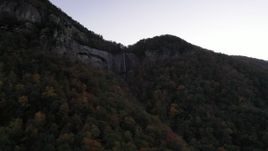2.7K stock footage aerial video approach a waterfall at sunset, Chimney Rock, North Carolina Aerial Stock Footage | CAP_014_011