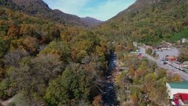 2.7K stock footage aerial video fly over a river by a small town road, Chimney Rock, North Carolina Aerial Stock Footage | CAP_014_035