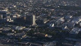 HD stock footage aerial video orbit an approach to apartment and college buildings, Hollywood, California Aerial Stock Footage | CAP_016_021