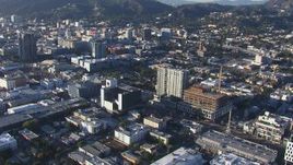 HD stock footage aerial video fly away from Emerson College for a wider view of Hollywood, California Aerial Stock Footage | CAP_016_024
