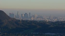 HD stock footage aerial video of a wide view of the city's skyline on a hazy day in Downtown Los Angeles, California Aerial Stock Footage | CAP_016_038
