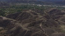 HD stock footage aerial video of flying above burned hills in Malibu, California Aerial Stock Footage | CAP_018_003