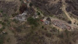HD stock footage aerial video of a bird's eye view of homes destroyed by fire, Malibu, California Aerial Stock Footage | CAP_018_005
