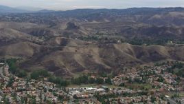 HD stock footage aerial video of an orbit of hills scarred by fire, Malibu, California Aerial Stock Footage | CAP_018_009