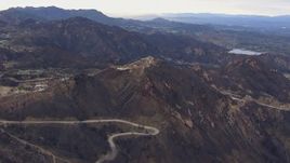 HD stock footage aerial video of mountains scarred by fire, Malibu, California Aerial Stock Footage | CAP_018_018