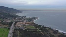 HD stock footage aerial video of flying toward oceanfront homes in Malibu at sunset, California Aerial Stock Footage | CAP_018_050