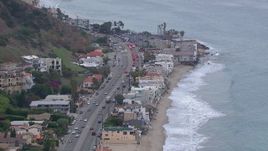 HD stock footage aerial video of beachfront homes by PCH at sunset, California Aerial Stock Footage | CAP_018_057