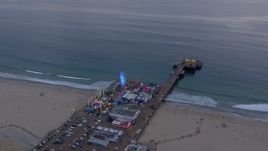 HD stock footage aerial video of orbiting Santa Monica Pier at sunset, California Aerial Stock Footage | CAP_018_066
