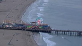 HD stock footage aerial video of orbiting the Ferris wheel at Santa Monica Pier at sunset, California Aerial Stock Footage | CAP_018_071