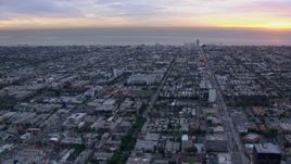 HD stock footage aerial video of Santa Monica and the ocean at sunset, California Aerial Stock Footage | CAP_018_076