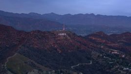 HD stock footage aerial video of approaching the Hollywood Sign at sunset, California Aerial Stock Footage | CAP_018_077
