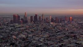 HD stock footage aerial video of the Downtown Los Angeles skyline at sunset, California Aerial Stock Footage | CAP_018_088