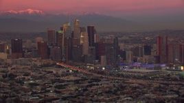HD stock footage aerial video of flying by Downtown Los Angeles skyscrapers at sunset, California Aerial Stock Footage | CAP_018_101