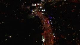 HD stock footage aerial video of zooming to light traffic on the Sunset Strip at night in West Hollywood, California Aerial Stock Footage | CAP_018_132