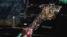 HD stock footage aerial video of orbiting The Grove shopping mall at night in Los Angeles, California Aerial Stock Footage | CAP_018_153