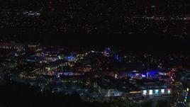 HD stock footage aerial video of circling the Universal Studios Hollywood theme park at night, Universal City, California Aerial Stock Footage | CAP_018_165