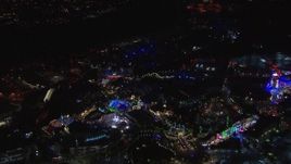 HD stock footage aerial video of orbiting the Universal Studios Hollywood theme park at night, Universal City, California Aerial Stock Footage | CAP_018_166