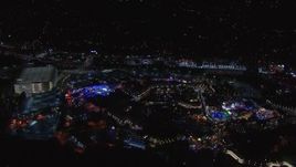 HD stock footage aerial video of flying around the Universal Studios Hollywood theme park at night, Universal City, California Aerial Stock Footage | CAP_018_169