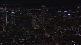HD stock footage aerial video a wide orbit of US Bank Tower and the city's skyline at night in Downtown Los Angeles, California Aerial Stock Footage | CAP_018_179