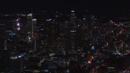 HD stock footage aerial video of an orbit of the city's skyline at night in Downtown Los Angeles, California Aerial Stock Footage | CAP_018_182