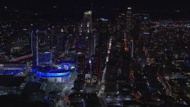 HD stock footage aerial video flyby Staples Center and the city's skyline at night, Downtown Los Angeles, California Aerial Stock Footage | CAP_018_184