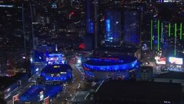 HD stock footage aerial video of panning to Staples Center at night, Downtown Los Angeles, California Aerial Stock Footage | CAP_018_188